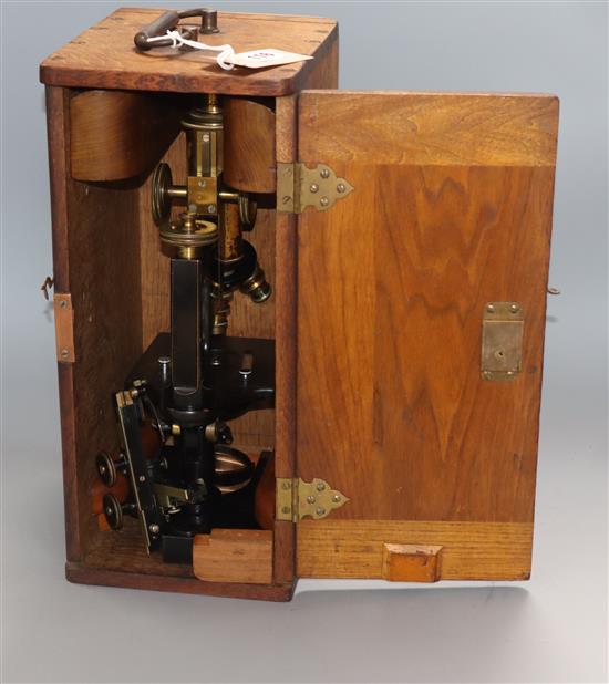 A Bausch & Lomb oak cased microscope